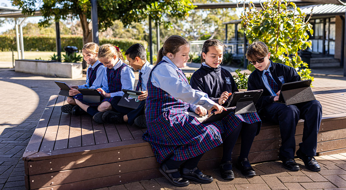 Students outside in sunshine at St Madeleine's Catholic Primary School Kenthurst
