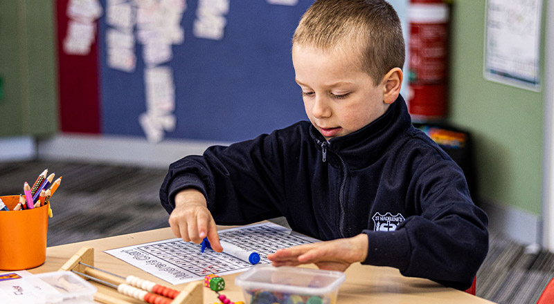 Student learning maths at St Madeleine's Catholic Primary School Kenthurst
