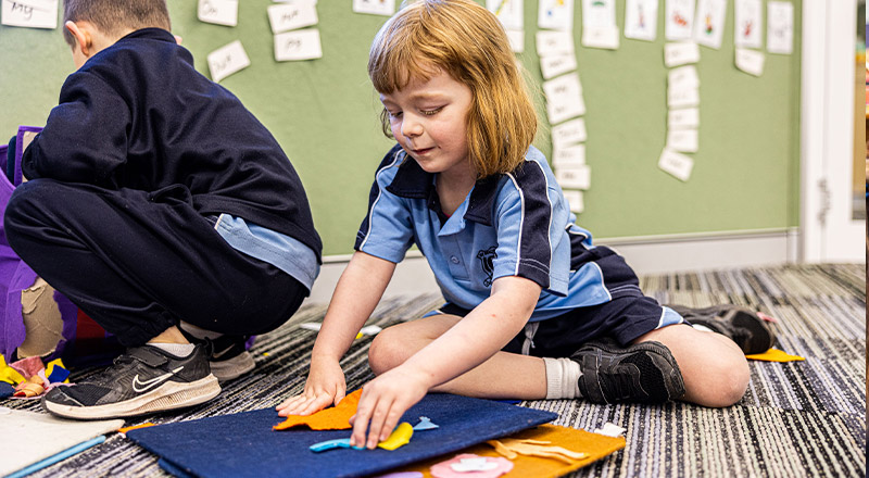 Student playing with equipment at St Madeleine's Catholic Primary School Kenthurst