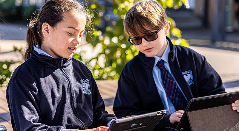 Students outside in sunshine at St Madeleine's Catholic Primary School Kenthurst