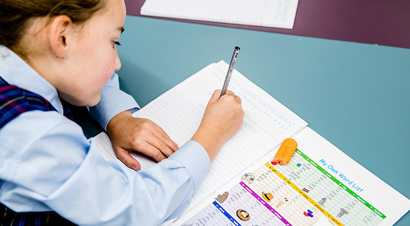 Close up shot of student learning at St Madeleine's Catholic Primary School Kenthurst