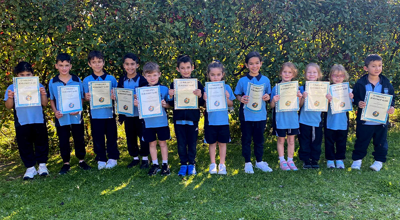 Students from St Madeleine's Catholic Primary School Kenthurst receiving awards