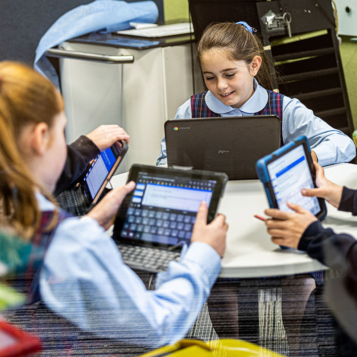 Students inside booth at St Madeleine's Catholic Primary School Kenthurst