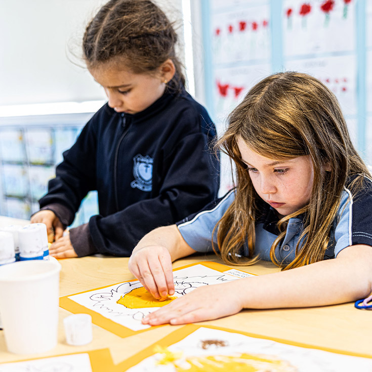 Students painting at St Madeleine's Catholic Primary School Kenthurst