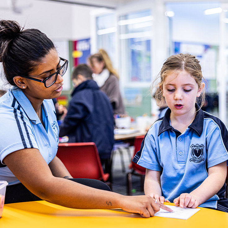 Dedicated teacher and student from St Madeleine's Catholic Primary School Kenthurst