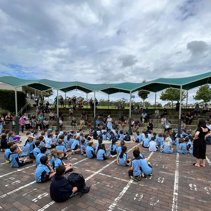 Students sitting in ampitheatre at St Madeleine's Catholic Primary School Kenthurst